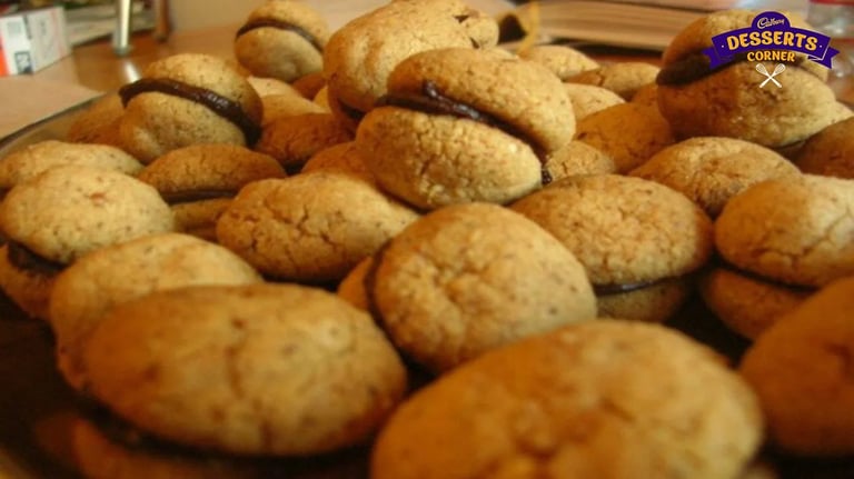 Cookies that start with the letter B: Baci di Dama, Ballokume, Boortsog, and Biscochitos