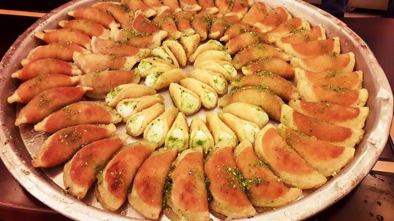 most delicious dessert recipes series: The Qatayef Is A Delicate Arabic Dessert That Is Fun To Make And Delicious To Eat