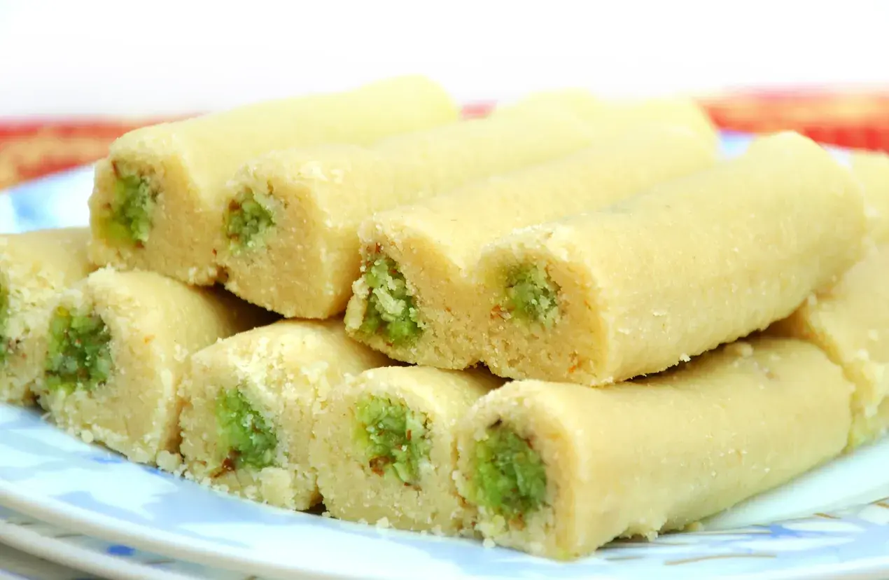 Kesar Pista Roll vs. Rose Pistachio Tart: Which One Wins the Holi Dessert Battle?