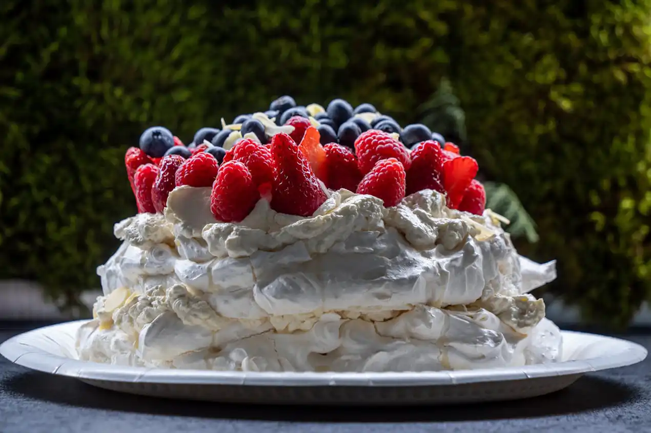 Pavlova Topped with Tropical Fruits: French Elegance Meets Indian Christmas Party